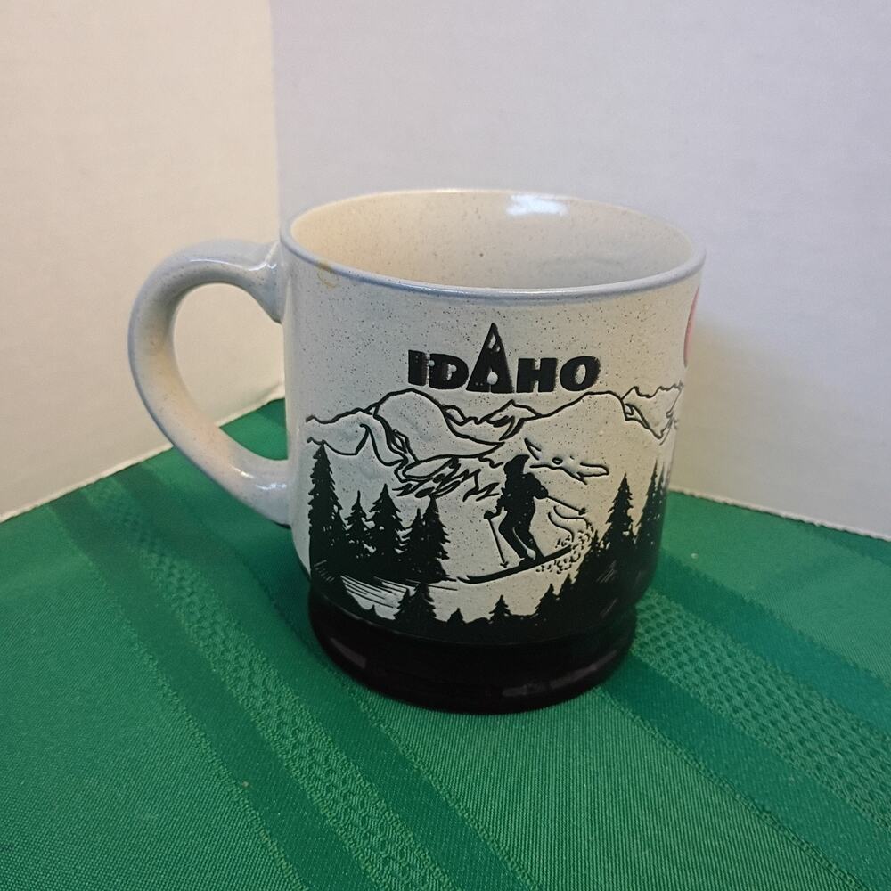 ISC Vintage Tan Speckled Idaho State Coffee Mug Elk Skier Mountain Theme